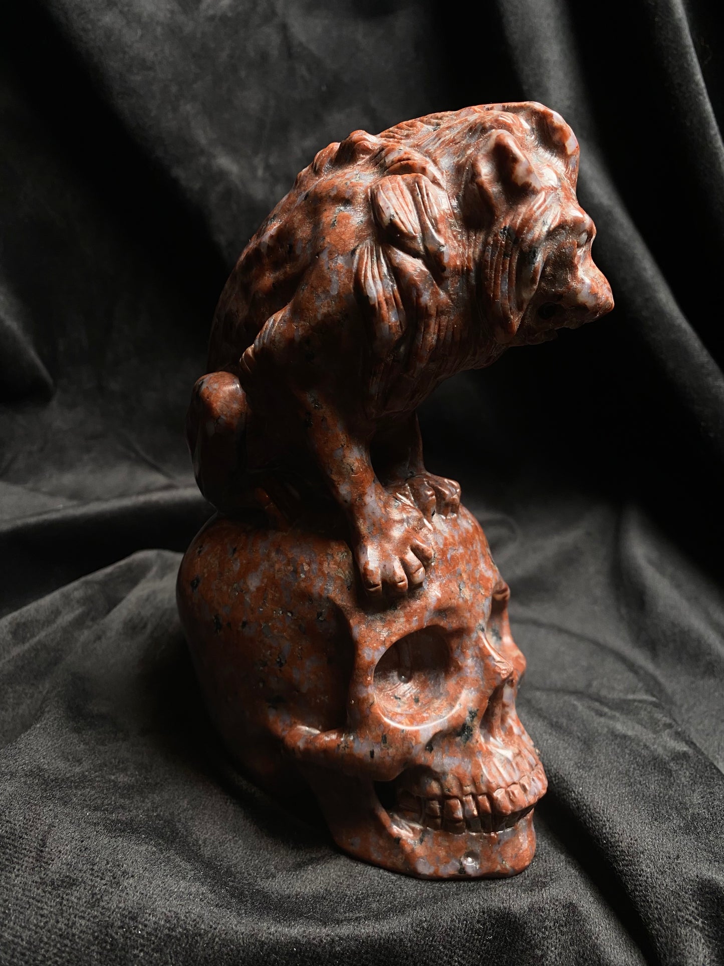 Large Imperial Red Granite Lion on top of a Skull